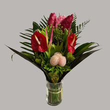 Tropical Bouquet with glass vase (1) Ginger Pink, (3) Ginger Red, (2) Anthurios, (2) Hel. Sassy, (2) Eucaliptos doll, (3) Lettuce Fern, (2) Palma Flecha, (2) Diafembancha, (2) Croto Pecoso, (1) Tip Bronce, (6) Codelines. 
